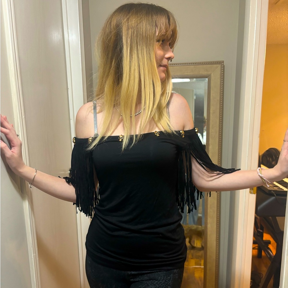 Cute size small off shoulder shirt with metal skeletons.